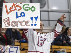 Michaël Pepin shows his support for the Montreal Force during their first Premier Hockey League home game against the Metropolitan Riveters in Verdun on Saturday, Nov.  26, 2022.