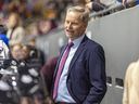 Montreal Force's head coach Peter Smith is behind the bench during the second period of the team's first Premier Hockey League home game against the Metropolitan Riveters in Verdun on Saturday, Nov. 26, 2022. 