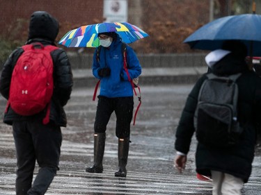 Pedestrians walk along Jean-Talon St. in Montreal on Wednesday Nov. 30, 2022.