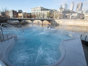 Guests at Bota Bota can sit beneath falling snow in the comfort of a hot tub.