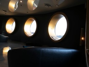 The relaxation area at Bota Bota features simulated portholes.