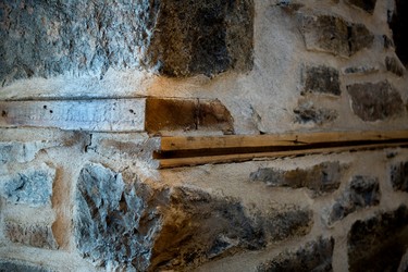 The original stone walls that were covered with drywall have been restored and exposed in the completely renovated Braemar home in Westmount on Dec. 13, 2014.