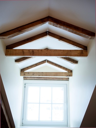 Original wood roof beams have been restored and exposed in the completely renovated Braemar home in Westmount on Dec. 13, 2014.