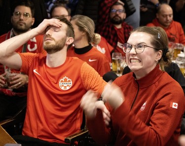 Fans at Montreal's Burgundy Lion pub react as Canada misses a chance against Belgium on Nov. 23, 2022