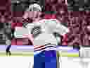 Kirby Dach taunts the Chicago crowd after boos rained down when he scored the winning shootout goal against his former team Friday afternoon at the United Center.