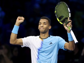 Félix Auger-Aliassime celebrates his win over Rafael Nadal of Spain during round robin play on Day Three of the Nitto ATP Finals at Pala Alpitour on November 15, 2022 in Turin, Italy.