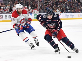 Johnny Gaudreau #13 of the Columbus Blue Jackets controls the puck against David Savard #58 of the Montreal Canadiens during the second period at Nationwide Arena on Nov. 17, 2022 in Columbus, Ohio.