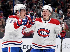 Brendan Gallagher #11 of the Montreal Canadiens celebrates his goal with Christian Dvorak #28 during the third period against the Columbus Blue Jackets at Nationwide Arena on Nov. 17, 2022 in Columbus, Ohio.