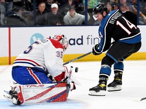 Gustav Nyquist #14 of the Columbus Blue Jackets takes a shot on goal against Sam Montembeault #35 of the Montreal Canadiens during the second period at Nationwide Arena on Nov. 23, 2022 in Columbus, Ohio.