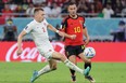 Canadian defender Alistair Johnston fights for the ball with Belgium forward Eden Hazard during World Cup action on Wednesday, Nov. 23, 2022 in Qatar.