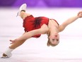 Julianne Seguin  performs at the 2018 Olympics in Gangneung, South Korea.