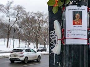 A running shoe is part of a memorial for Conceptión Cortacans, the jogger killed in 2016 by a driver running a red light on Park Ave. across from the George Etienne-Cartier monument at the base of Mount Royal.