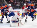 Canadiens goalie Jake Allen makes the save as Edmonton Oilers' Connor McDavid (97) jumps during second period NHL action in Edmonton on Saturday, Dec. 3, 2022.