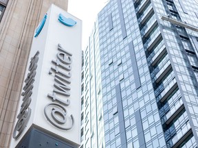 The Twitter sign is seen at their headquarters in San Francisco. "It would be wrong to think that because Twitter’s implosion is happening thousands of miles away in California that it doesn’t have an impact on us here. It does," Martine St-Victor writes.
