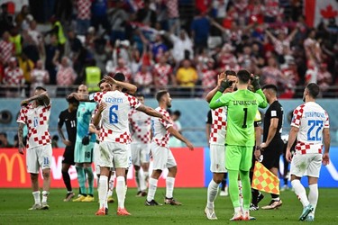 Croatia's players celebrate after winning the Qatar 2022 World Cup Group F football match between Croatia and Canada at the Khalifa International Stadium in Doha on Nov.27, 2022.