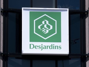 A Caisse populaire Desjardins sign is seen in Montreal on June 18, 2019.