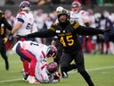 Hamilton Tiger-Cats linebacker Jovan Santos Knox celebrates after sacking Montreal Alouettes quarterback Trevor Harris during the second half of the CFL Eastern Semifinals in Hamilton on November 28, 2021.