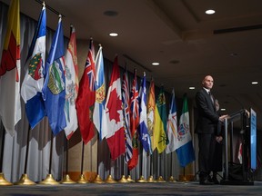 Federal Health Minister Jean-Yves Duclos listens to a question during a news conference without his provincial counterparts after the second of two days of meetings, in Vancouver, on Tuesday, November 8, 2022.