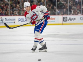 Montreal Canadiens centre Nick Suzuki makes a pass during the third period against the Minnesota Wild at Xcel Energy Center in Saint Paul, Minn., on Nov. 1, 2022.