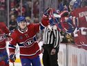Montreal Canadiens forward Cole Caufield celebrates with teammates after scoring a goal against the Pittsburgh Penguins during the third period at the Bell Centre in Montreal on Saturday, Nov. 12, 2022.