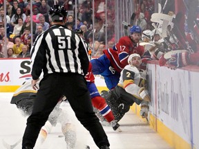 Canadiens forward Josh Anderson (17) checks Vegas Golden Knights defenceman Alex Pietrangelo (7) from behind during the third period at the Bell Centre  on Saturday, Nov. 5, 2022, in Montreal.