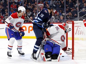 Jets right wing Blake Wheeler (26) scores on Montreal Canadiens goaltender Sam Montembeault (35) in the second period at Canada Life Centre in Winnipeg on Thursday, Nov. 3, 2022.