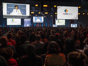 Adeeba Kamarulzaman, president of the International Aids Society, addresses the opening ceremony of the AIDS 2022 conference in Montreal on July 29, 2022. Immigration, Refugees and Citizenship Canada says it has found no fault in its handling of visas for the conference last summer where multiple African delegates alleged racism, ahead of another international summit next month.