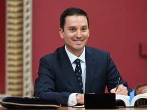 Quebec Justice Minister and government house leader Simon Jolin-Barrette is sworn in during a ceremony at the Quebec Legislature, in Quebec City, Thursday, Oct. 20, 2022.