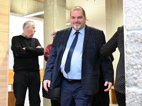 Former MNA Harold LeBel walks to the courtroom after a break in Rimouski on Monday, Nov. 14, 2022.