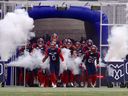 Montreal Alouettes players enter for the Eastern semifinal against the Hamilton Tiger-Cats at Montreal's Percival Molson Memorial Stadium on Nov. 6, 2022. 