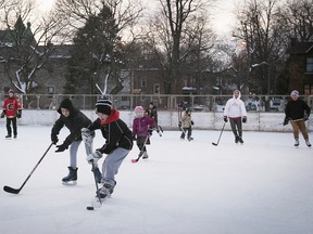 Skaters play a game of shinny hockey at N.D.G. Park in 2018.
