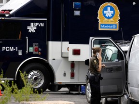The scene at a St-Laurent motel where Abdulla Shaikh, the suspect in three killings over a 24-hour period in August, was killed during a police operation.