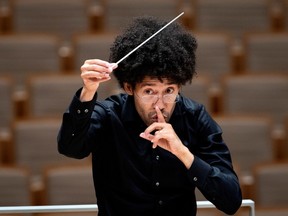 The Orchestre symphonique de Montréal's music director, Rafael Payare, conducts the OSM in a rehearsal in Montreal Aug. 3, 2022.