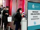 Delegates check in at the Palais des congrès ahead of the COP15 biodiversity meeting Dec. 7-19 in Montreal.