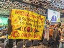 Members of West Coast Indigenous tribes protest during Prime Minister Justin Trudeau's opening remarks for COP15 at the Palais des congrès in Montreal on Tuesday December 6, 2022.
