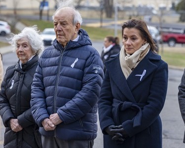 École Polytechnique president Maud Cohen, right, observes a moment of silence next to Louis Courville, the school's director general in 1989 at a ceremony on Dec. 6, 2022.