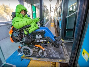 Martin Dion gets on a bus at the Du Mont-Royal SRB Pie-IX station in Montreal Thursday Dec. 8, 2022.