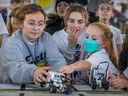 A student from Dorval Elementary School is shown wearing a mask during a day-long robotics competition hosted by Pierrefonds Community High School last Friday.