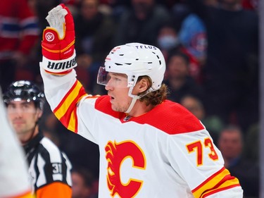 Calgary Flames' Tyler Toffoli acknowledges Montreal Canadiens fans during the first period of a National Hockey League game in Montreal Monday Dec. 12, 2022.  It was Toffoli's first game back in Montreal since being traded last spring.