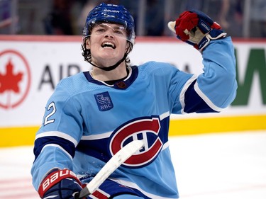 Canadiens right wing Cole Caufield (22) celebrates scoring to tie the game during NHL action against the Anaheim Ducks in Montreal, on Thursday, Dec. 15, 2022.