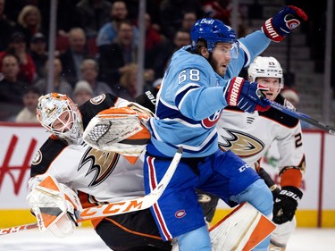 Canadiens left wing Mike Hoffman (68) collides with Anaheim Ducks goaltender Lukas Dostal (1) during NHL action in Montreal, on Thursday, Dec. 15, 2022. A penalty was called on the play.