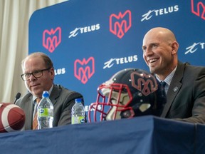 Montreal Alouettes new head coach Jason Maas, right, and general manager Danny Maciocia during a news conference at the Marriott Chateau Champlain Hotel in Montreal on Dec. 20, 2022.