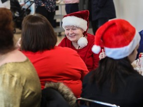 Johanne Ranger (facing camera) talks with Linda DeGagné at a Christmas party at Sarto Desnoyers Community Centre in Dorval on Dec. 16 for adults using community and institutional mental health services. The Christmas party is a collaborative effort between mental health community organizations (Centre Bienvenue, Community Perspective in Mental Health, L'Équipe Entreprise, Omega Community Resources) and several CIUSS teams (PACT, SIV, and Réseau Éclaireurs).