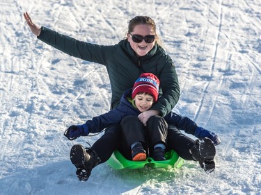 Vera Saramet and her 4-year-old son, Jason Sidhu hit the hills at Angrignon Park in LaSalle on Thursday Dec. 29, 2022.