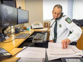 Montreal police Commander Jean-Sébastien Caron, head of the major crimes division, at work at his Montreal office.