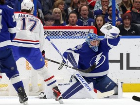 TAMPA, FL - DECEMBER 28: Andrei Vasilevskiy #88 of the Tampa Bay Lightning makes a save against the Montreal Canadiens during the second period at the Amalie Arena on December 28, 2022 in Tampa, Florida.
