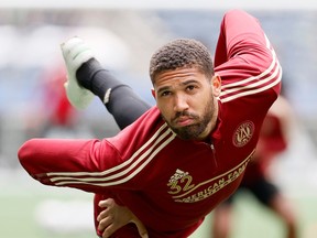 George Campbell #32 of Atlanta United stretches before the game against the Seattle Sounders at Lumen Field on May 23, 2021 in Seattle, Washington.