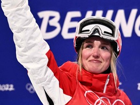 Canada's Justine Dufour-Lapointe reacts after her run in the freestyle skiing women's moguls final during the Beijing 2022 Winter Olympic Games at the Genting Snow Park A & M Stadium in Zhangjiakou on February 6, 2022.