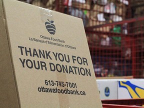 Boxes of donated food are placed in an Ottawa Food Bank warehouse.