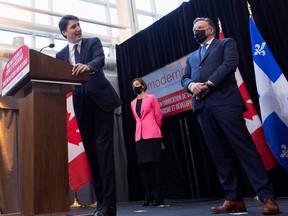 Canadian Prime Minister Justin Trudeau and Quebec Premier François Legault at a press conference in April 2022.
